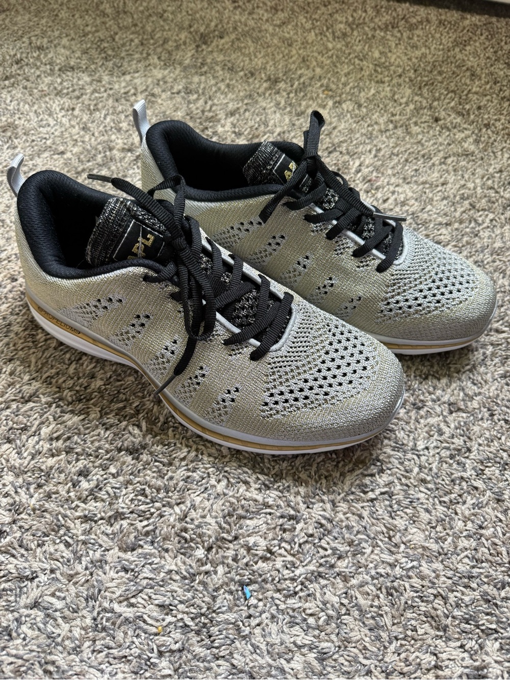 APL TechLoom Pro sneakers in a metallic silver and gold